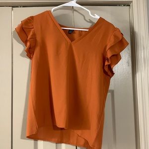 Orange ruffley Top from Shein; size S; never worn